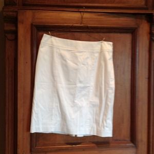 White skirt with cute riffle at the back