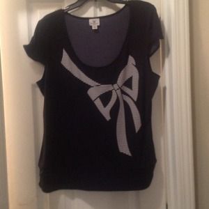 Black shirt white bow