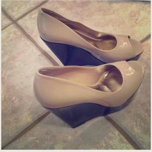 Nude and black wedges