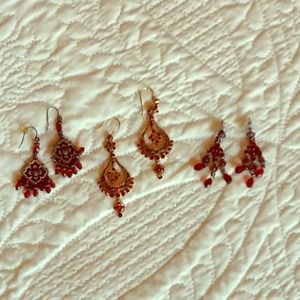Trio of red jeweled chandelier earrings