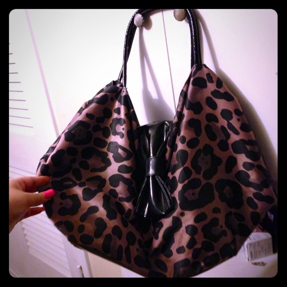 Great roomy bag bought at a local boutique .