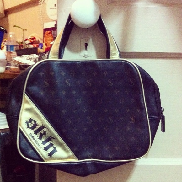 Skin industries purse