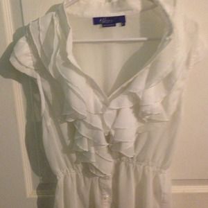 White sleeveless ruffle top