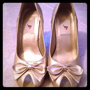 Gold peep toe bow pumps