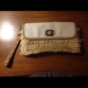 Sold. Authentic Coach hula clutch/wristlet. $228.