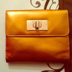 Gucci gold wallet