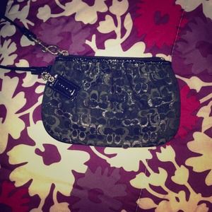 Black and silver Coach wristlet 😍