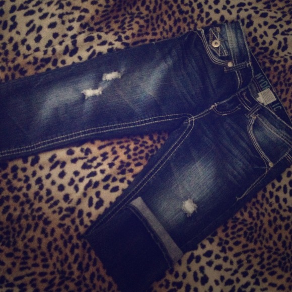 Dark blue denim capris.