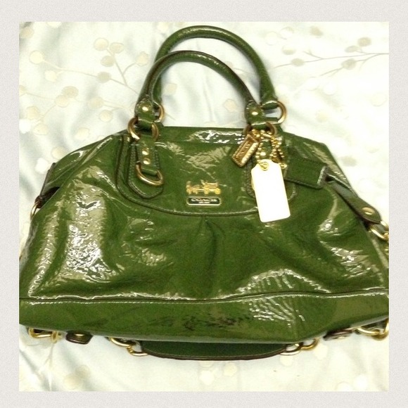 Coach patent leather w/all the bells &whistles.