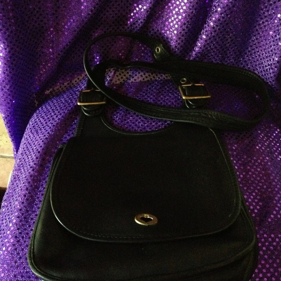 Authentic Vintage Coach Black with Gold Hardware.
