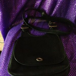 Authentic Vintage Coach Black with Gold Hardware.