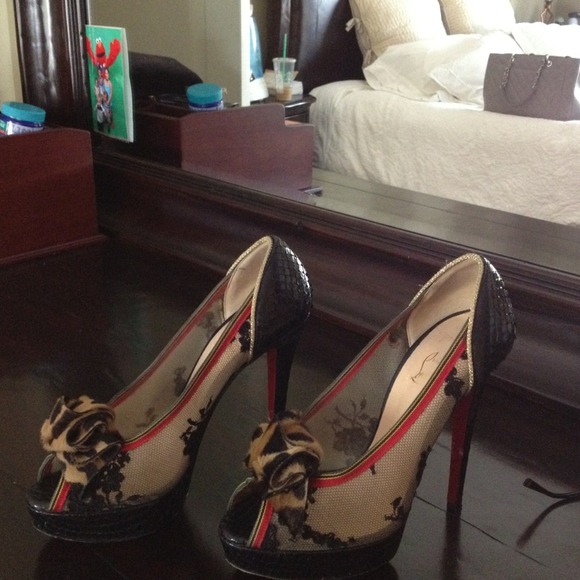 Favorite one of a kind louboutins! With box