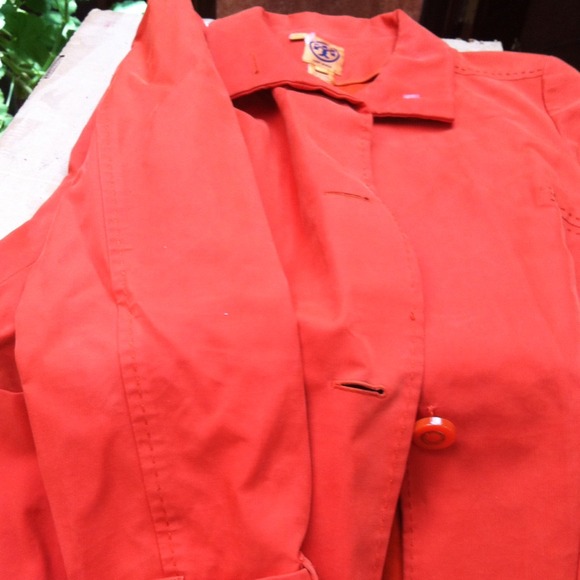 Tory burch orange trench coat.