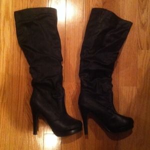 black leather high heel boots