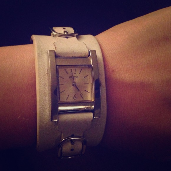 Guess watch. White leather with silver hardware.