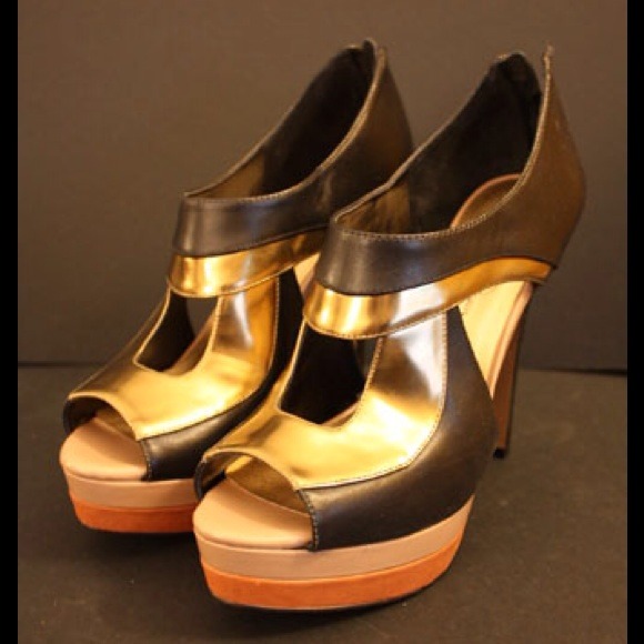 Jessica Simpson Shoes - RESERVeDJessica Simpson gold and black heels