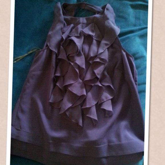 The limited purple ruffle shirt size small