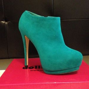 Teal Booties. Never worn.
