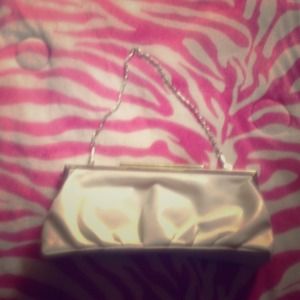 Super Cute Charlotte Russe white clutch with chain