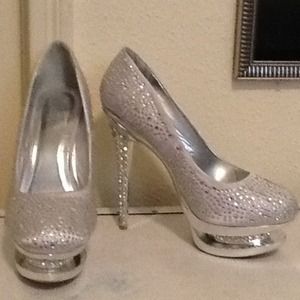 Silver jeweled pumps