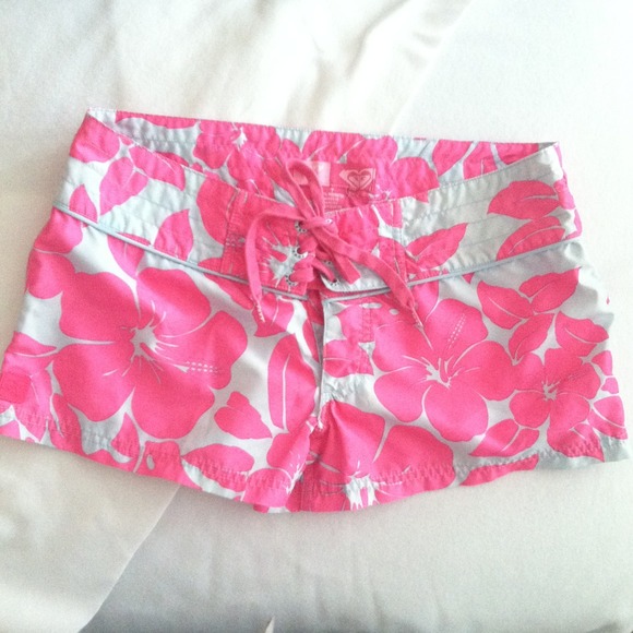 Pink and blue board shorts