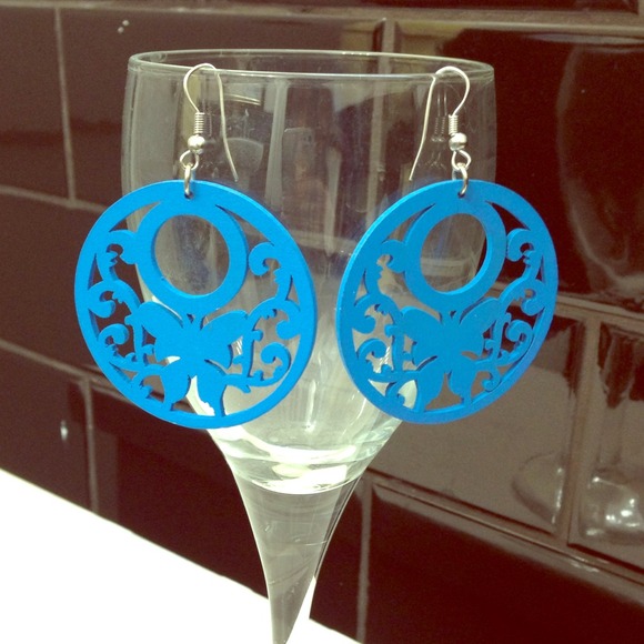 Blue earrings wood carved