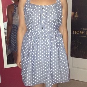 Greyish polka dot dress with white lace back