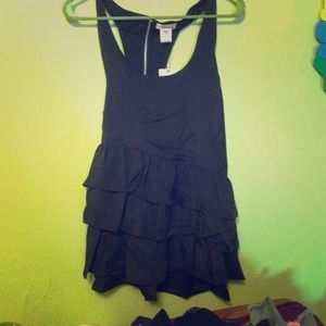 Ruffled black sleeveless top