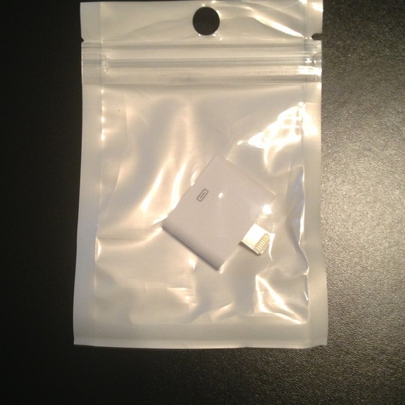 iPhone 5 adapter Sealed in pack.