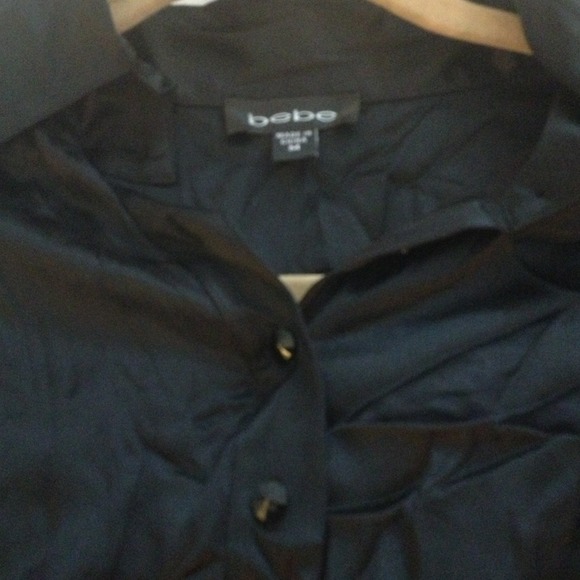 Silk button up blouse.