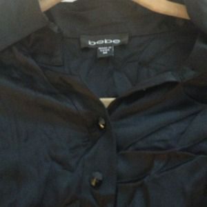 Silk button up blouse.