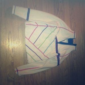 White fleece with multi-colored stitching lines