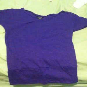 It is a purple zebra see through top