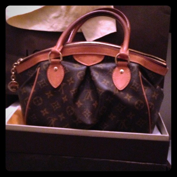 Authentic LV Tivoli PM in good condition.