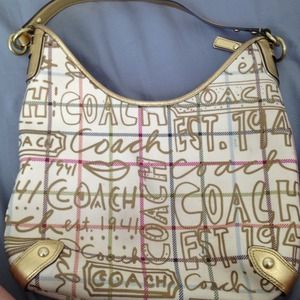 Coach graffiti purse with gold trim pink lining