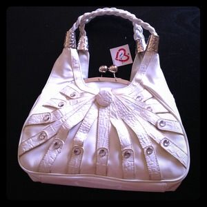 A white Veni Couture handbag