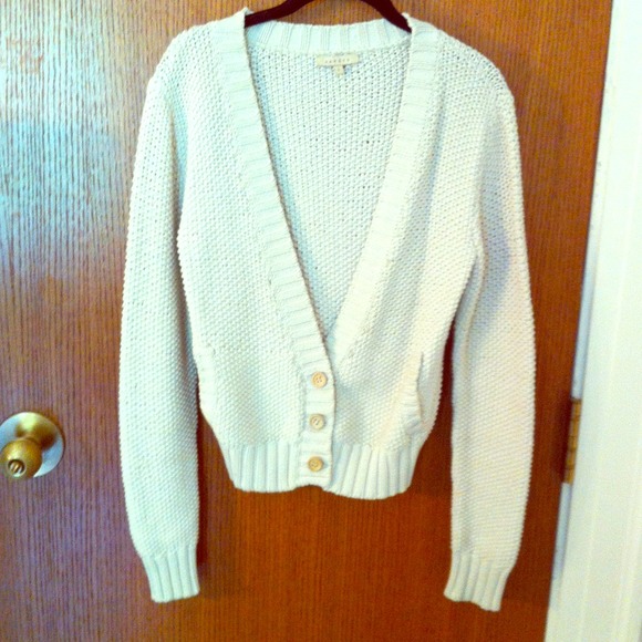 Sandro jacket with gold sewing around collar.