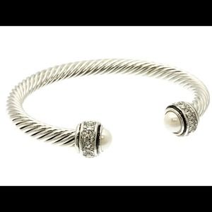 Pearl tip silver cable twist bracelet.