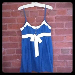 Blue Top with Flattering White Ribbon