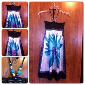 Beautiful dress with flower and beads around neck