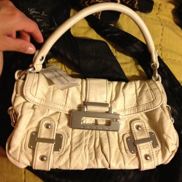SOLD Flawless cream Guess bag