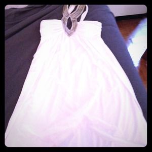 White, above-knee, cocktail dress.