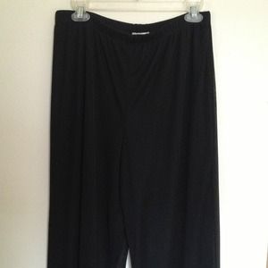 Black pants with a sheer later on top.