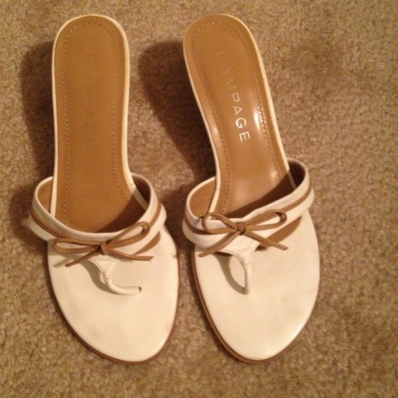 White and brown kitten heel