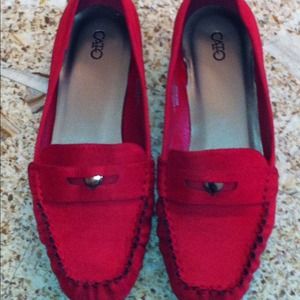 Red suede loafer.