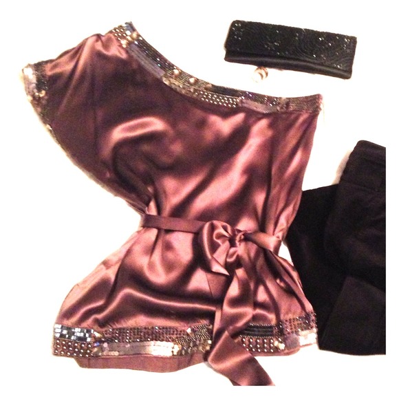 Shiny, off the shoulder Bebe blouse.. Just sexy!
