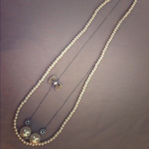 Plastic pearl like long necklace