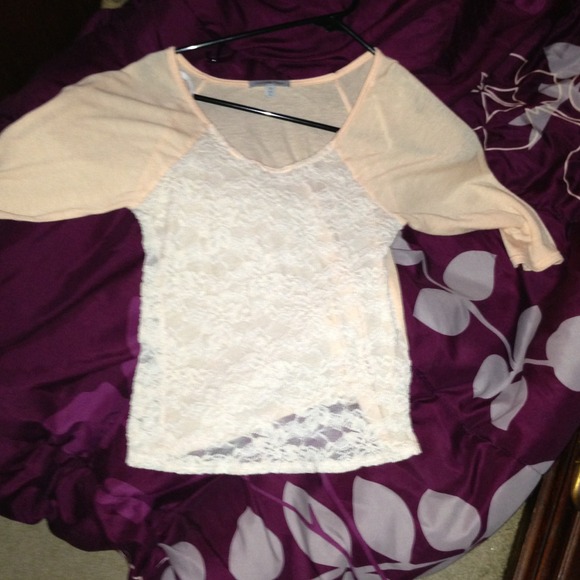 Peach Top with white Lace front.