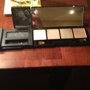 Flirt brand black and brown eyeshadow sets.