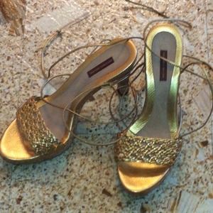 Gold three inch cork heel
